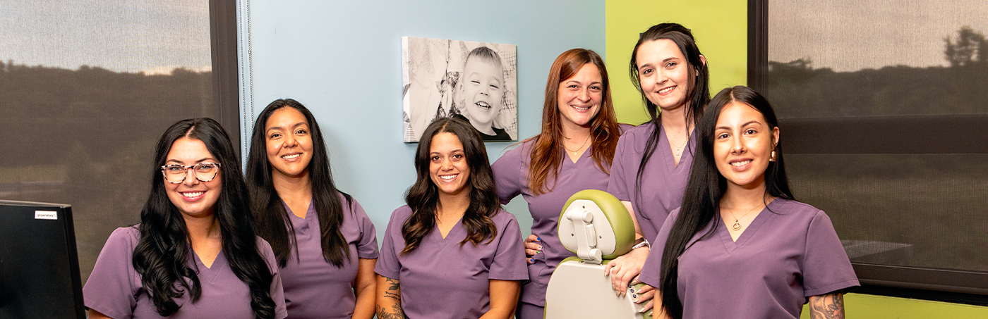 The smiling team at LMK Pediatric Dental Care in Crown Point
